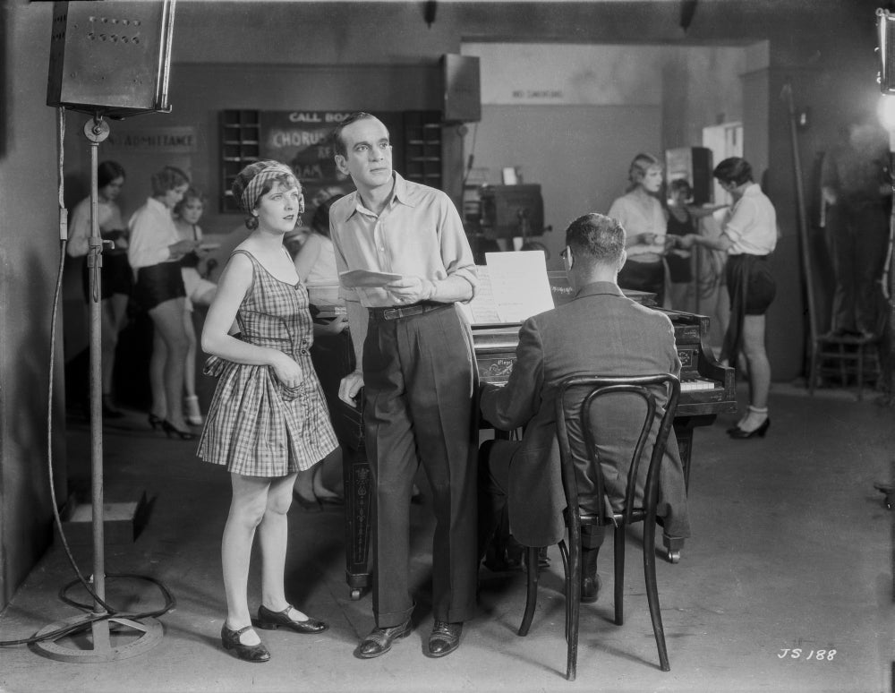 Al Jolson classic movie scene photo print near the piano.