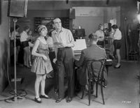 Al Jolson classic movie scene photo print near the piano.