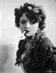 Pert Kelton posed photo print leaning while smoking