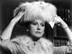 Deborah Kerr touching her furry hat photo print