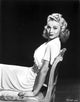 Carole Landis elegantly posed in a dress photo print.