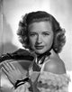 Priscilla Lane Off-Shoulder Lace Posed Photo Print