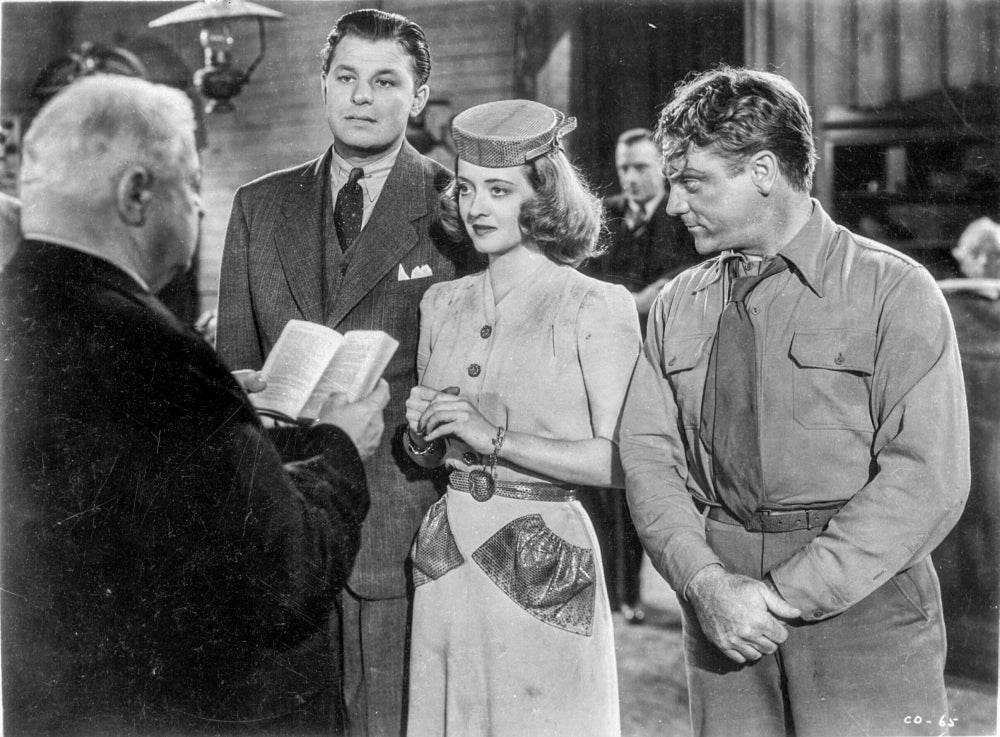 A scene from The Bride Came COD Photo Print capturing classic cinema moments.