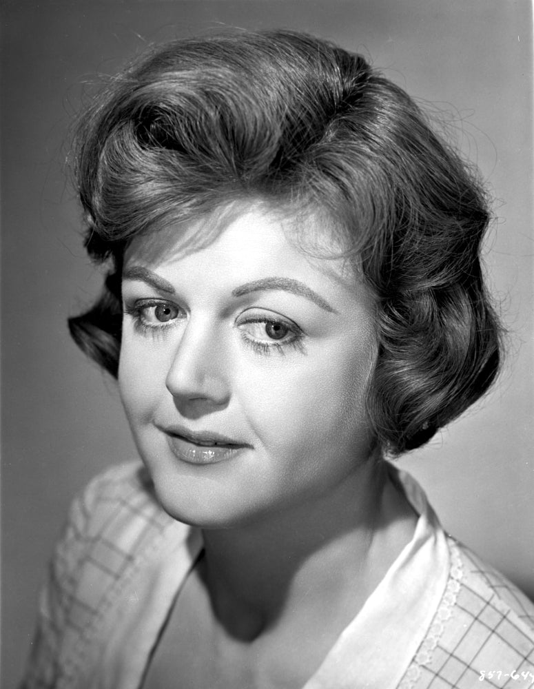 Angela Lansbury smiling in a checkered dress photo print.