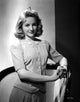 Dona Lee Standing and Leaning Portrait Photo Print