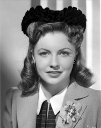 Joan Leslie posed photo print showcasing classic Hollywood glamour.