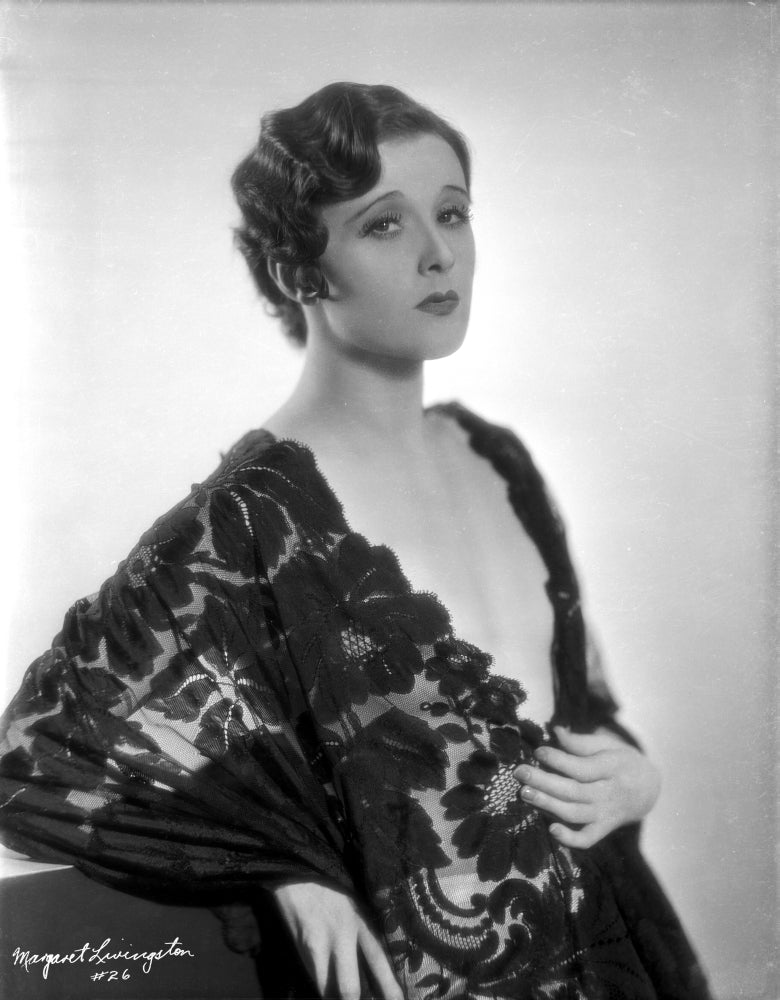 Margaret Livingston posed in an embroidered dress photo print.