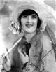 Margaret Livingston wearing a lace and embroidered dress photo print