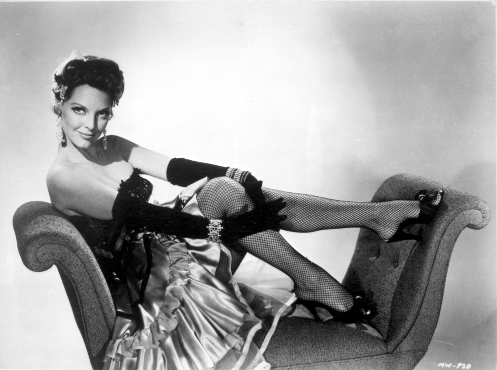 Julie London sitting on a chair in a silk skirt photo print