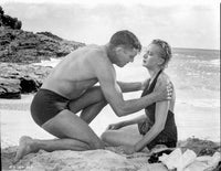 From Here To Eternity photo print of a man and woman on the seashore.