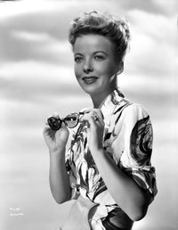 Ida Lupino posed in a printed dress and sunglasses, classic Hollywood photo print.