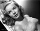 Diana Lynn posed photo print in an embroidered top.