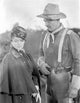 She Wore a Yellow Ribbon photo print of a man with a hat and woman talking.