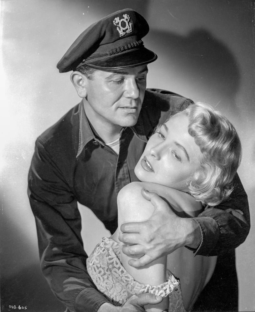 Breaking Point photo print featuring a man in sheriff attire and a woman in a printed dress