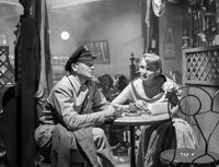 Breaking Point photo print of a man and woman posed at the bar