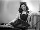 Marcy McGuire seated photo print showcasing her elegance and charm.