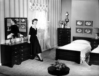 Dorothy Malone posed photo print in a bedroom setting, available in multiple sizes.