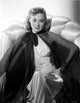 Adele Mara posed photo print in a dress, showcasing classic Hollywood elegance.