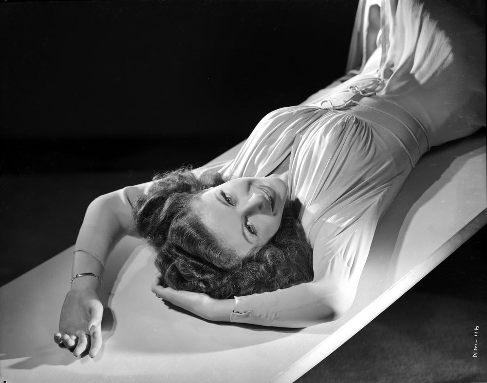 Nancy Marlow Lying in Classic Photo Print showcasing elegance and sophistication.