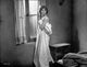 Inside Daisy Clover Photo Print featuring elegant pose in white dress.