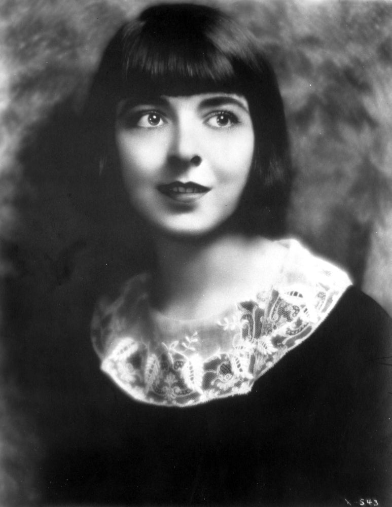 Colleen Moore smiling portrait photo print, showcasing classic Hollywood charm.