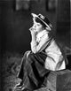 Colleen Moore portrait photo print in a blazer sitting pose.