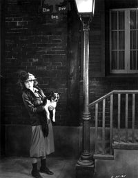 Colleen Moore Holding a Dog Photo Print