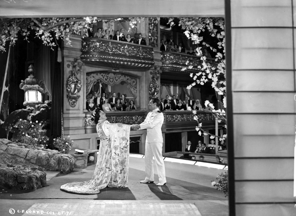 Grace Moore sitting in a printed gown photo print.