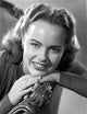 Terry Moore Seated and Leaning Black and White Photo Print
