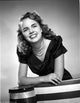 Terry Moore Leaning and Smiling Portrait Photo Print