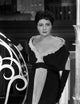 Helen Morgan in an off shoulder dress photo print