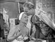 Carnival Story Couple Scene Photo Print showcasing a romantic carnival atmosphere.