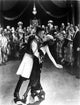 Mae Murray Dancing with a Man Photo Print showcasing classic Hollywood elegance.