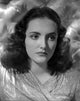 Joan Newton on a Silk Top Photo Print showcasing elegance and charm.