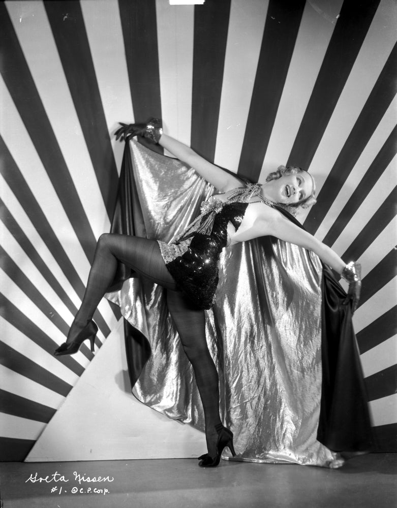 Greta Nissen photo print with a stripe background, showcasing classic style.
