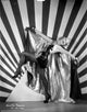 Greta Nissen photo print with a stripe background, showcasing classic style.