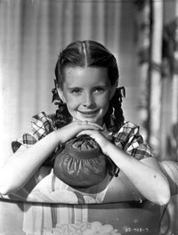 Margaret O'Brien smiling in a lace top photo print.