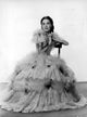 Maureen O'Sullivan seated in a ball gown - Vintage photo print.