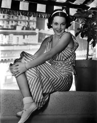 Maureen O'Sullivan seated in a stripe dress - Photo Print