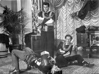 Houdini Two Men on Ground Photo Print showcasing a moment of magic.