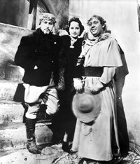 Portrait of Merle Oberon and co-stars in historical costume photo print.