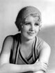 Photo print of Anita Page wearing a sleeveless top, capturing vintage elegance.