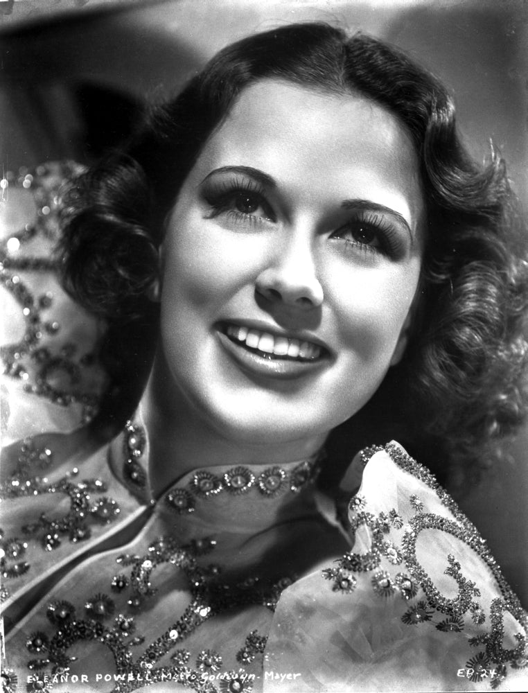 Eleanor Powell smiling photo print on embroidered top, perfect for home decor.