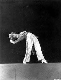 Eleanor Powell bending backward pose photo print showcasing elegance and vintage charm.