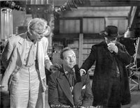 Boogie Man Will Get You photo print featuring three men in formal wear from the film.
