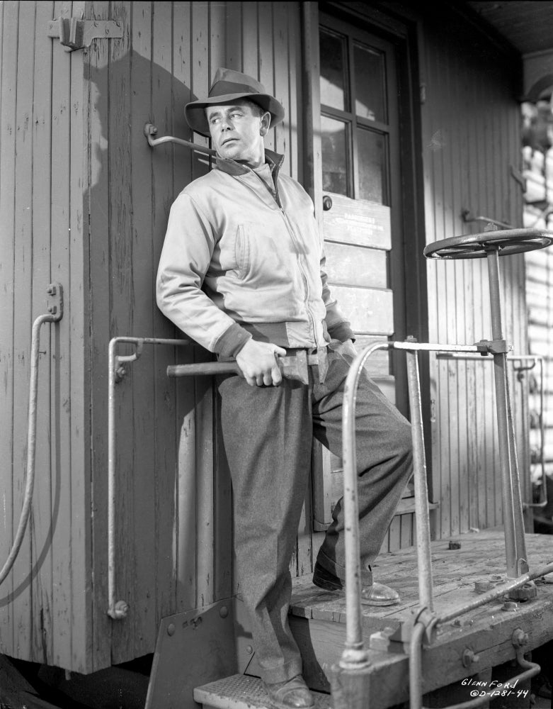 Human Desire photo print of a man leaning against a wall