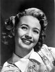 Jane Powell smiling photo print in a printed top