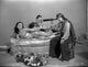 Looking For Danger photo print featuring a lady lying on bed with two men.