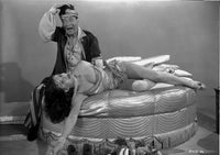 Looking For Danger Couple Lying in Bed Photo Print