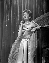 Helen Morgan on stage in a silk dress photo print.